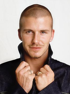 David Beckham in short hairstyle with a cute smile on his face