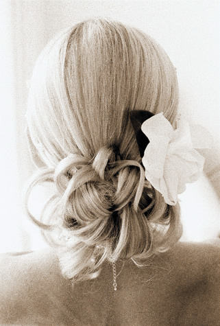 Updo Hairstyle With White Rose