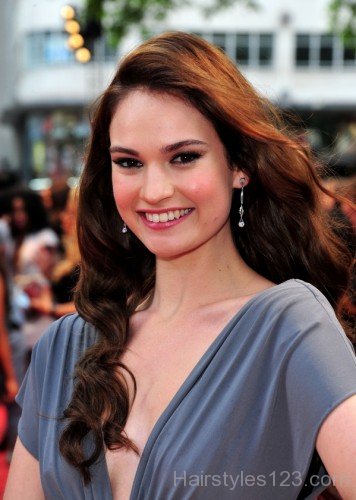 Long Wavy Hairsytle Of Lily James