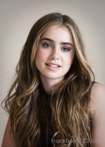 Long Layered Hairstyle Of Lily Collins