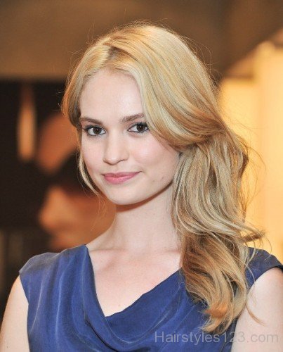 Stylish Blonde Wavy Hairstyle Of Lily James