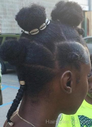 Bantu knots with Cowrie shells