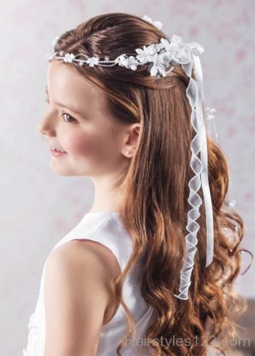 Communion hairstyle with soft curls